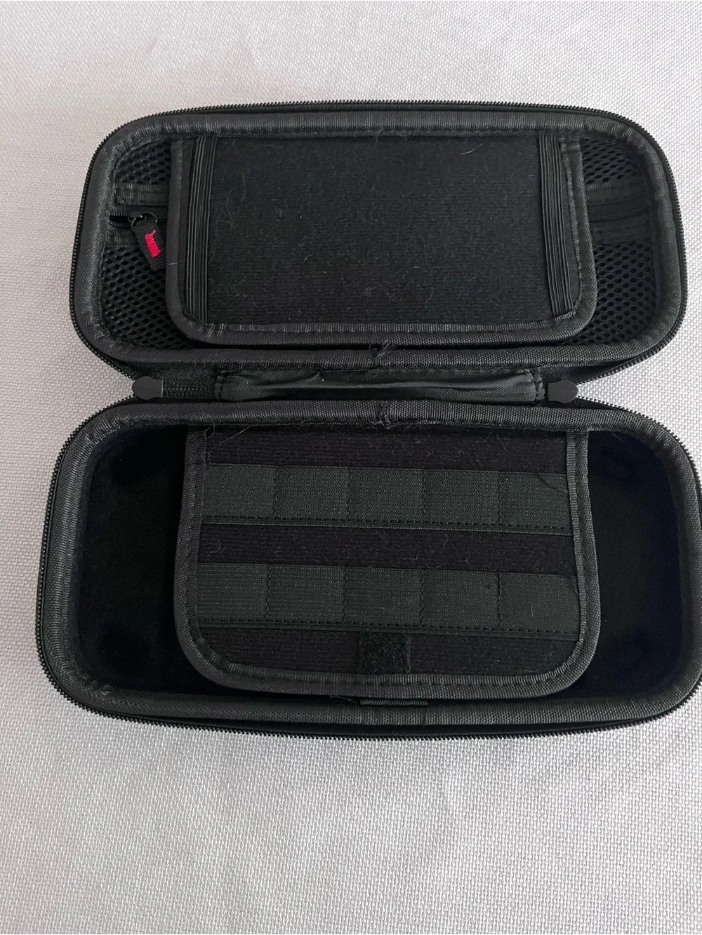 Source Unknown slim carrying